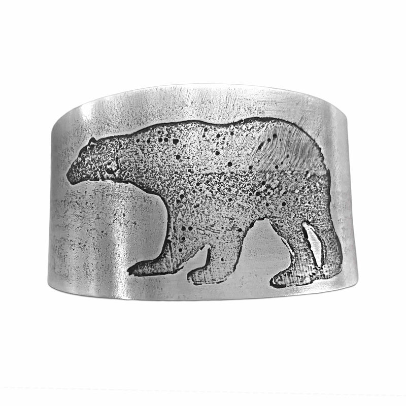 Polar Bear Cuff featuring a unique etched polar bear design on raw brass, adding rustic charm to any outfit.