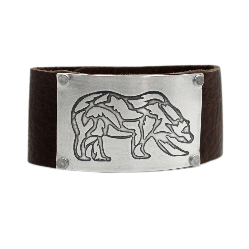 Rocky Bear Leather Cuff Bracelet with a silver grizzly bear design on a brown leather band.