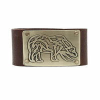 Rocky Bear Leather Cuff Bracelet featuring a grizzly bear in antique brass on a leather band.