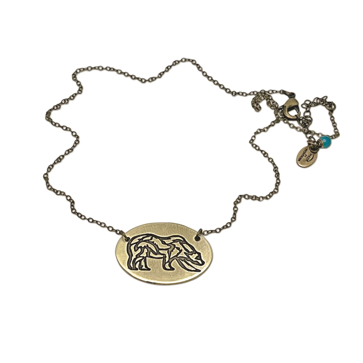 Rocky Bear Necklace featuring an elegant grizzly bear pendant on a delicate chain.