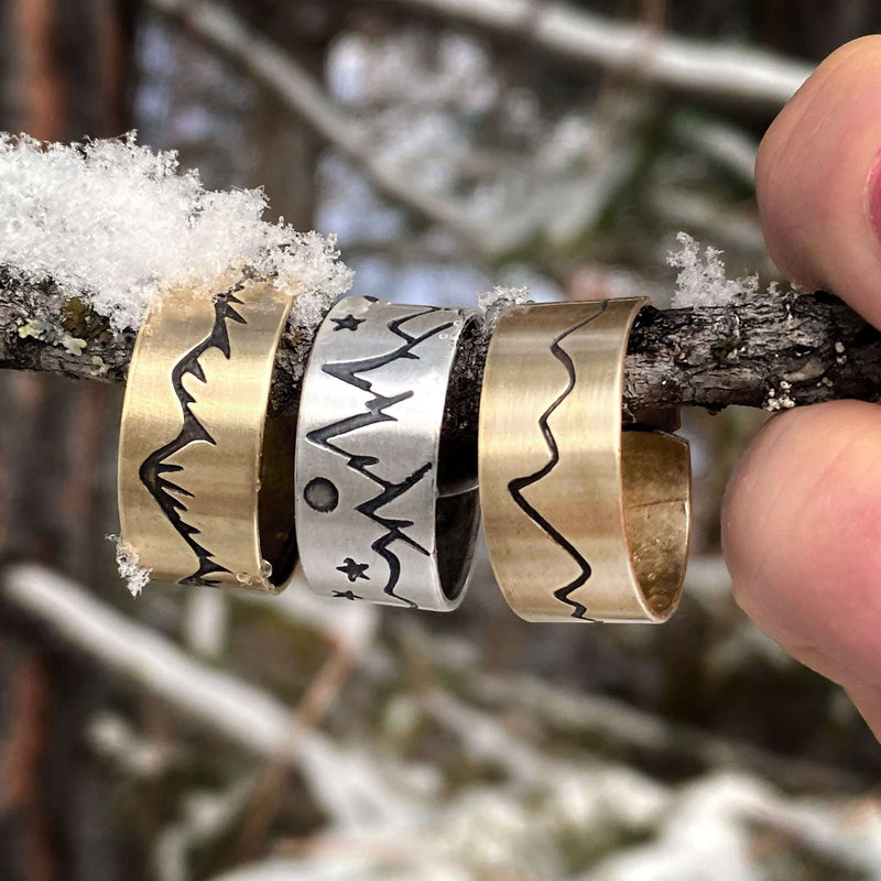 Simple Mountain Adjustable Ring showcasing handmade brass and silver designs inspired by mountain ranges.