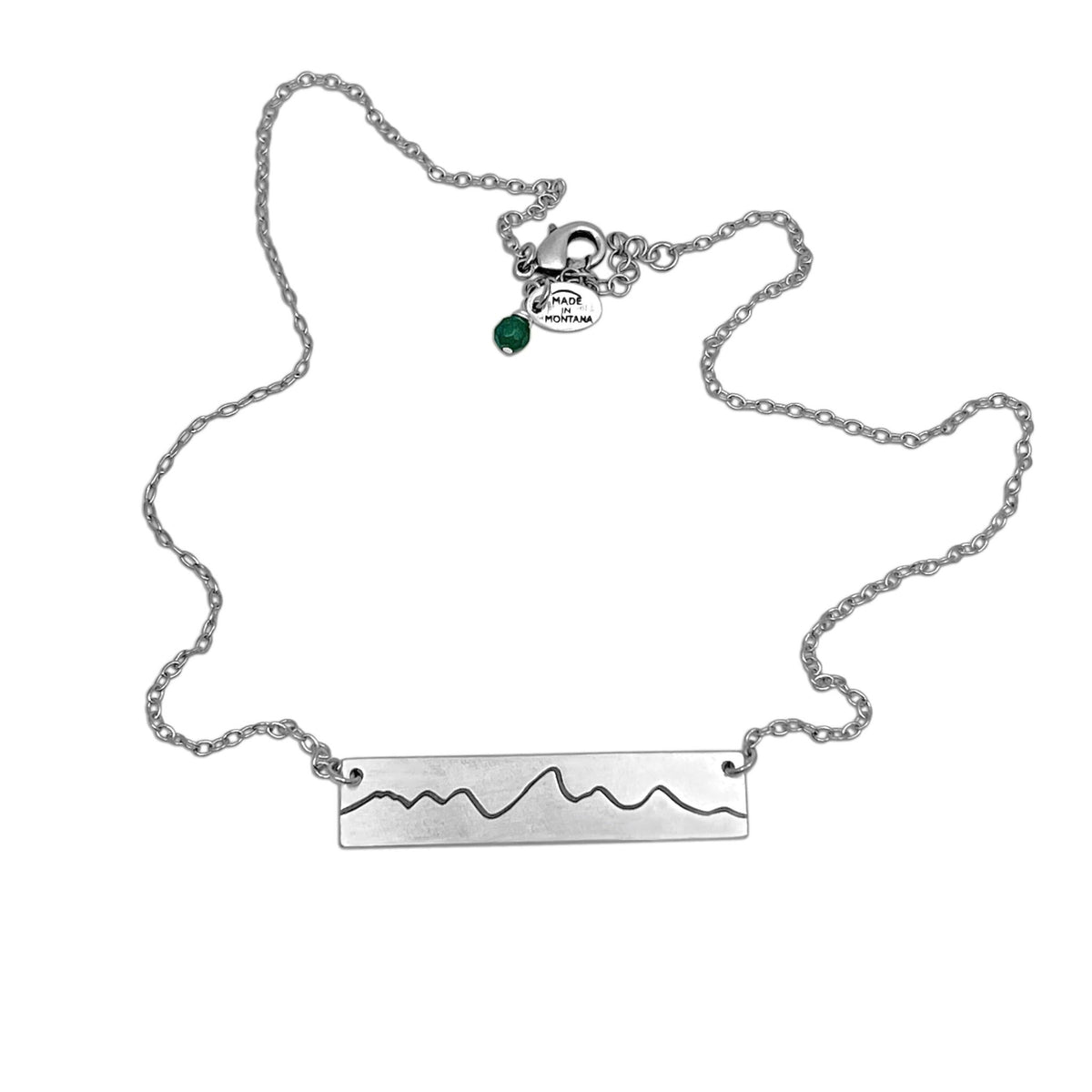 Simple Teton Mountain Necklace with a silver chain and mountain range pendant, perfect for nature lovers.