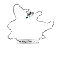 Simple Teton Mountain Necklace with a silver chain and mountain range pendant, perfect for nature lovers.