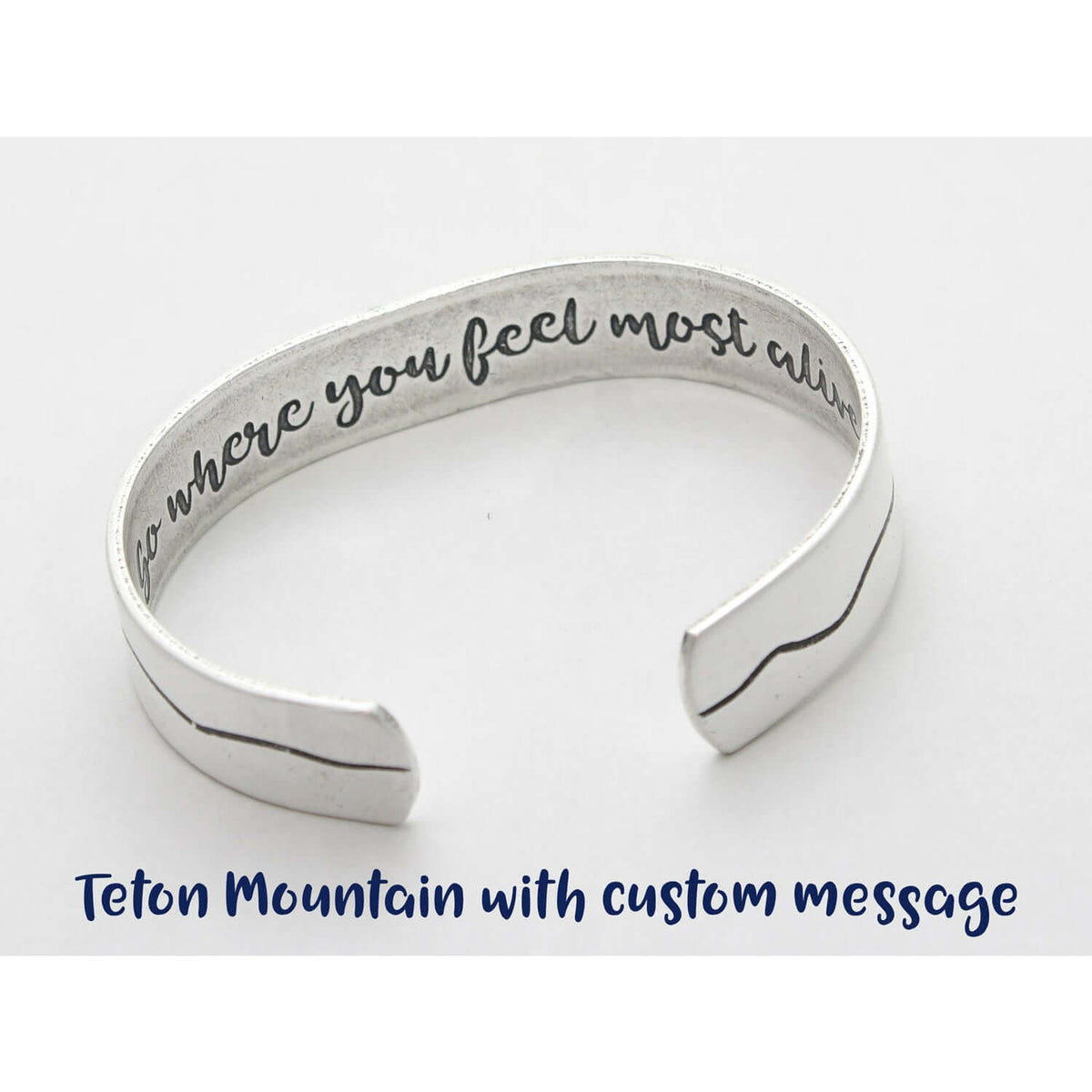 Simple Tetons Cuff Bracelet showcasing a custom message inside, perfect for nature lovers and outdoor enthusiasts.