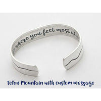 Simple Tetons Cuff Bracelet showcasing a custom message inside, perfect for nature lovers and outdoor enthusiasts.