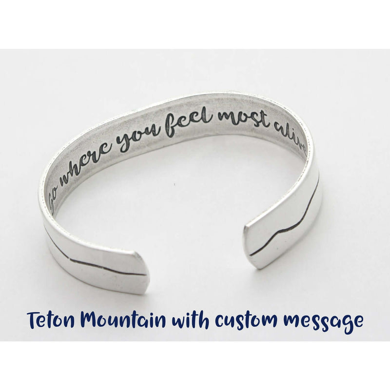 Simple Tetons Cuff Bracelet showcasing a custom message inside, perfect for nature lovers and outdoor enthusiasts.