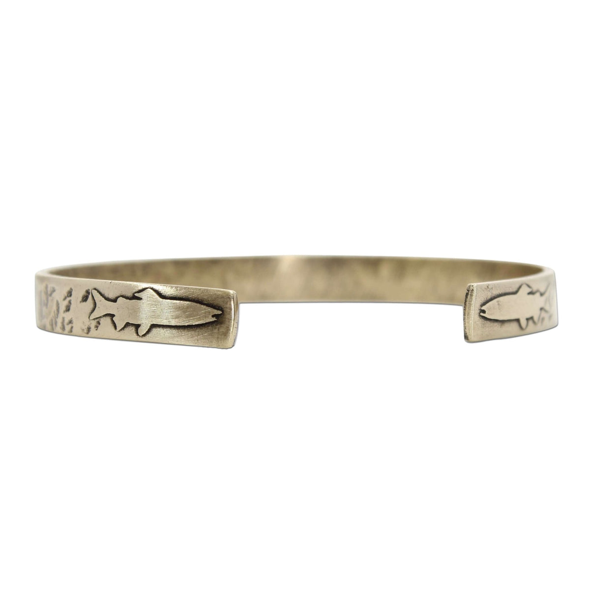 Skinny Fish Cuff Bracelet featuring etched fish design and textured raw brass finish.