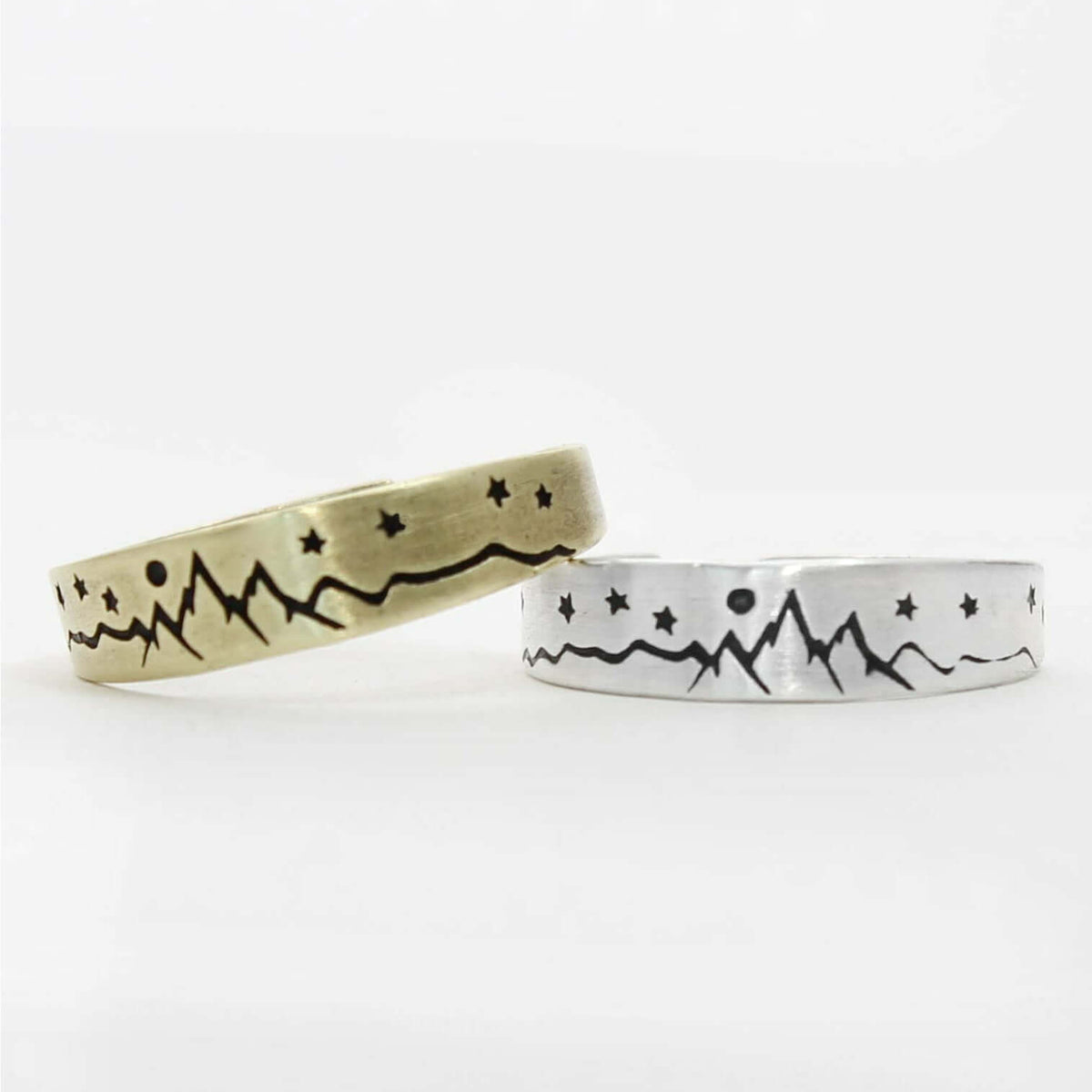 Skinny High Alpine Adjustable Ring in brass and silver with mountain and star designs