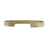 Skinny Moose Cuff Bracelet featuring etched moose designs on tips, crafted from raw brass, 1/4" wide.