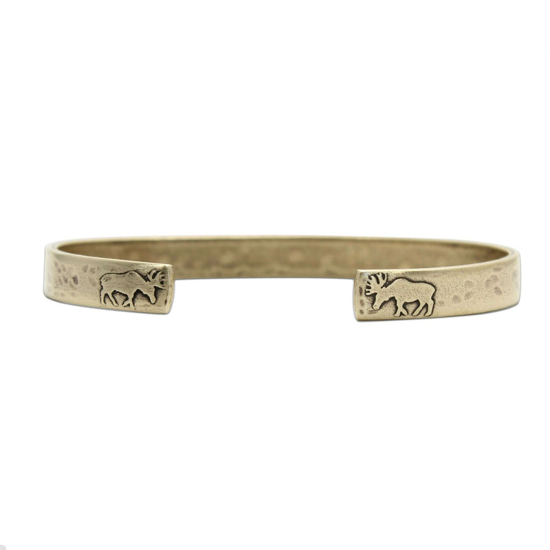 Skinny Moose Cuff Bracelet featuring etched moose designs on tips, crafted from raw brass, 1/4" wide.