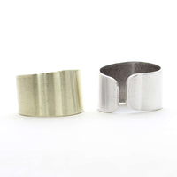 Slate Adjustable Ring in Antique Brass and Matte Silver finishes, showcasing versatility and style for any occasion.