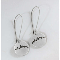 Snowcap Mountain Earrings featuring snowcapped mountain peaks in circular disks with long kidney earwires.