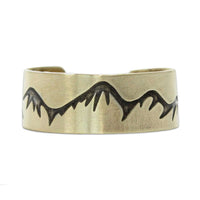 Snowcaps Adjustable Ring featuring mountain design etched on high-quality brass, available in Matte Silver and Antique Brass finishes.