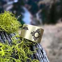 Sol Adjustable Ring featuring Zia sun design on raw brass, perfect for sun-worshippers and summer lovers.