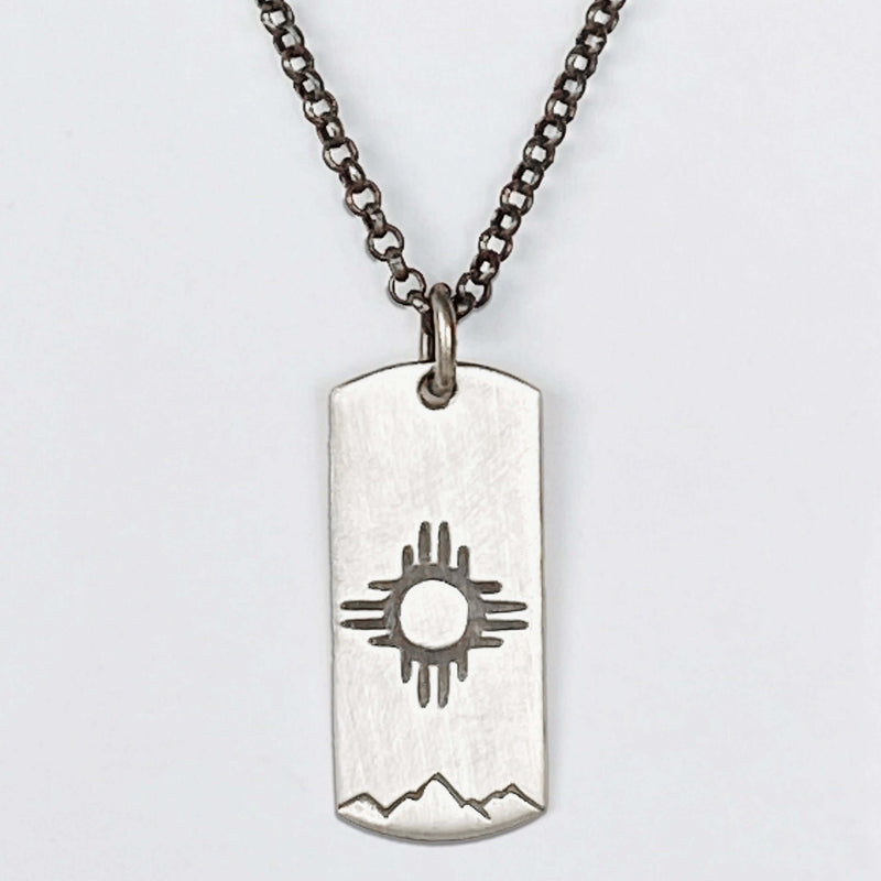 Sol Necklace featuring Zia sun design on silver, beautifully crafted for a stylish look.