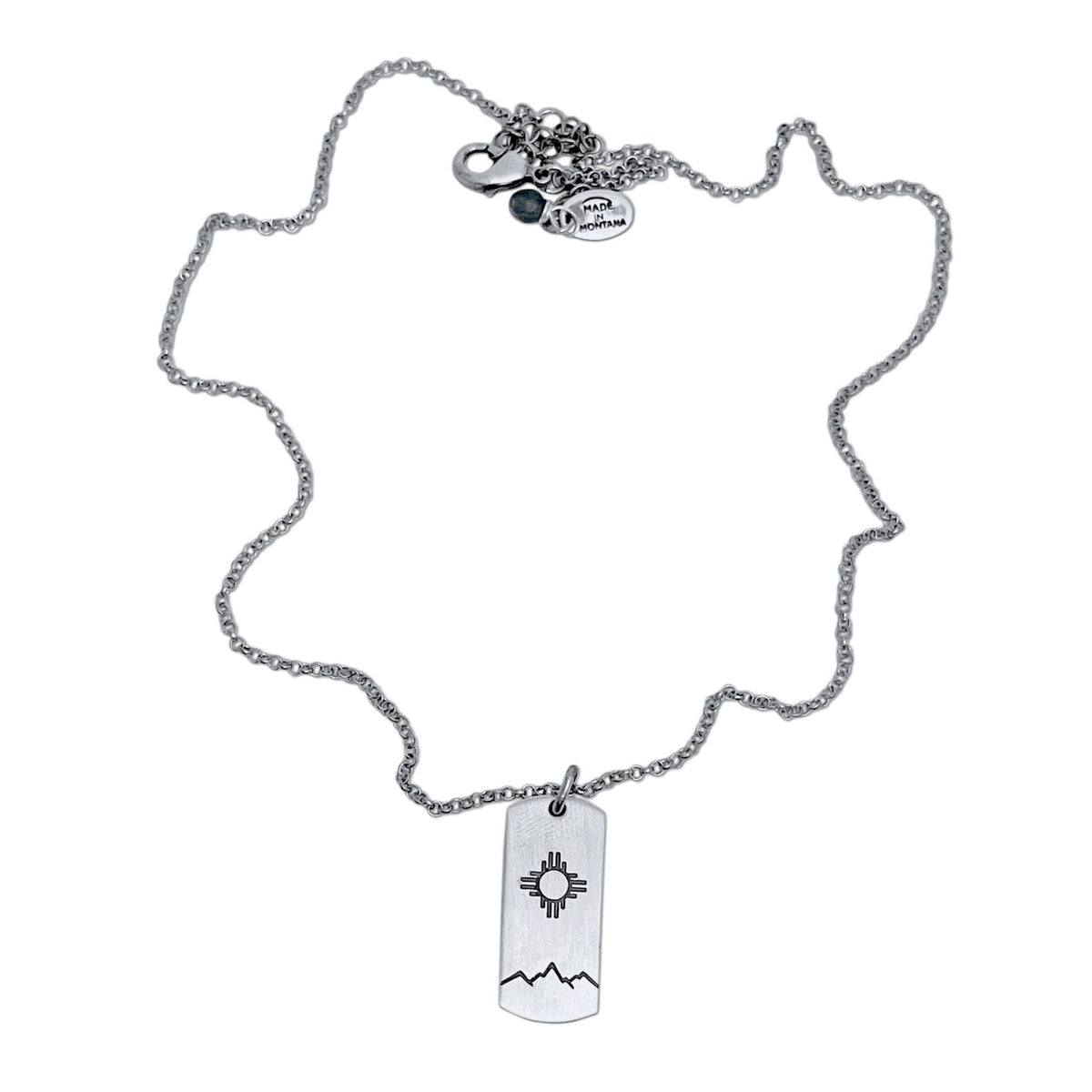 Sol Necklace featuring a silver chain with Zia sun design pendant, perfect for any wardrobe.