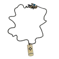 Sol Necklace featuring iconic Zia sun design on raw brass, adjustable chain options available.