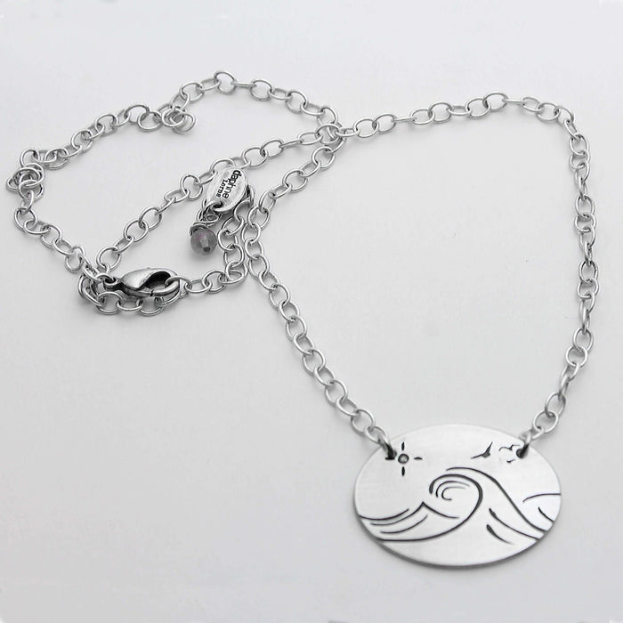 Swell Necklace featuring wave etched design in matte silver, adjustable 18" cable chain, handmade in Montana.