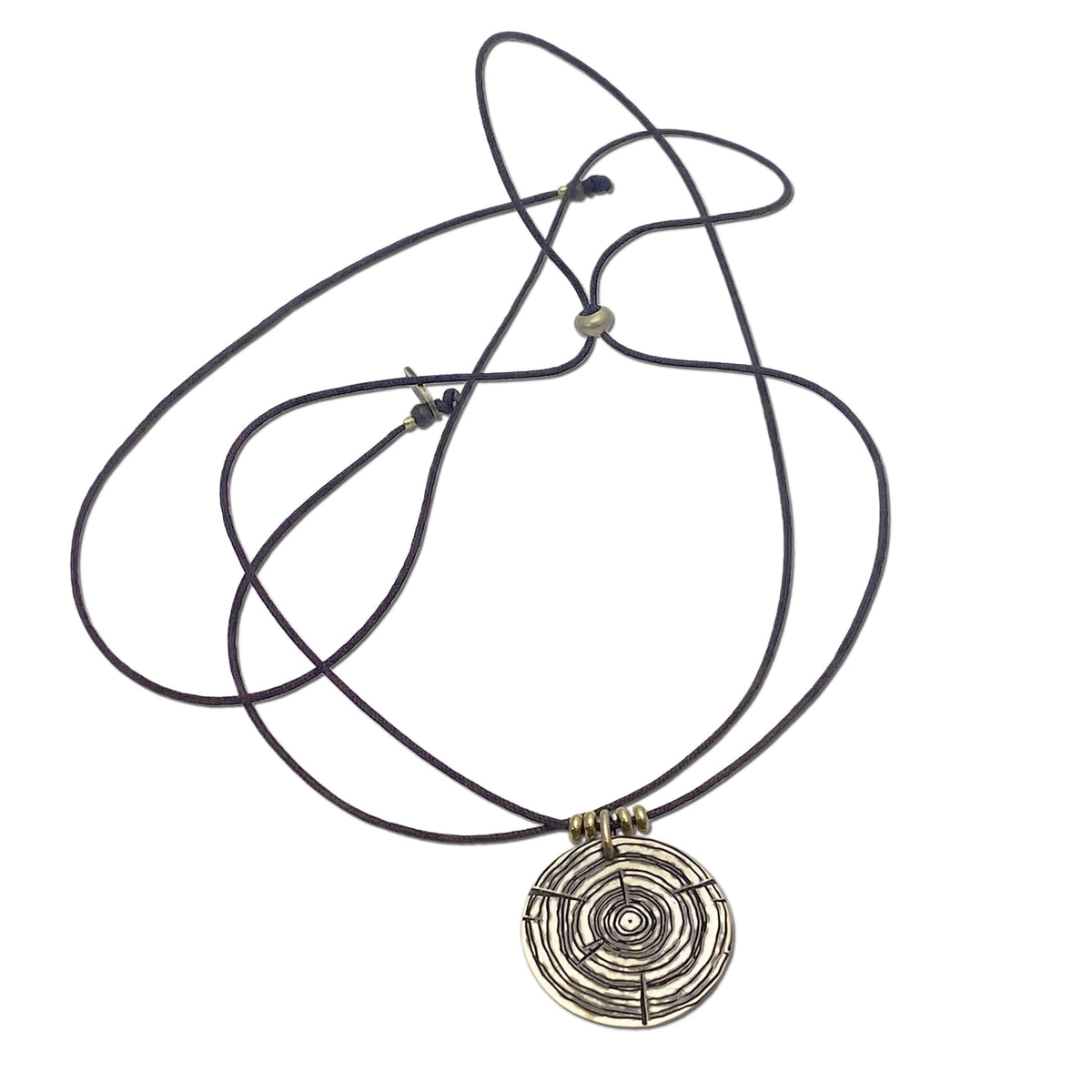 Timber Necklace featuring a circular wood round design on an adjustable cord, perfect for nature lovers.
