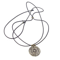 Timber Necklace featuring a circular wood round design on an adjustable cord, perfect for nature lovers.