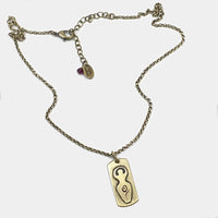 Triple Goddess Necklace in antique brass finish on an adjustable rolo chain, featuring goddess figure and moon phases.