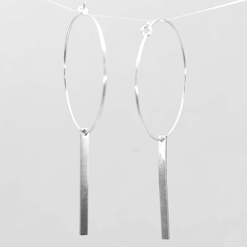 Twigs Hoop Earrings in Matte Silver featuring sleek twig design and classic hoop style.