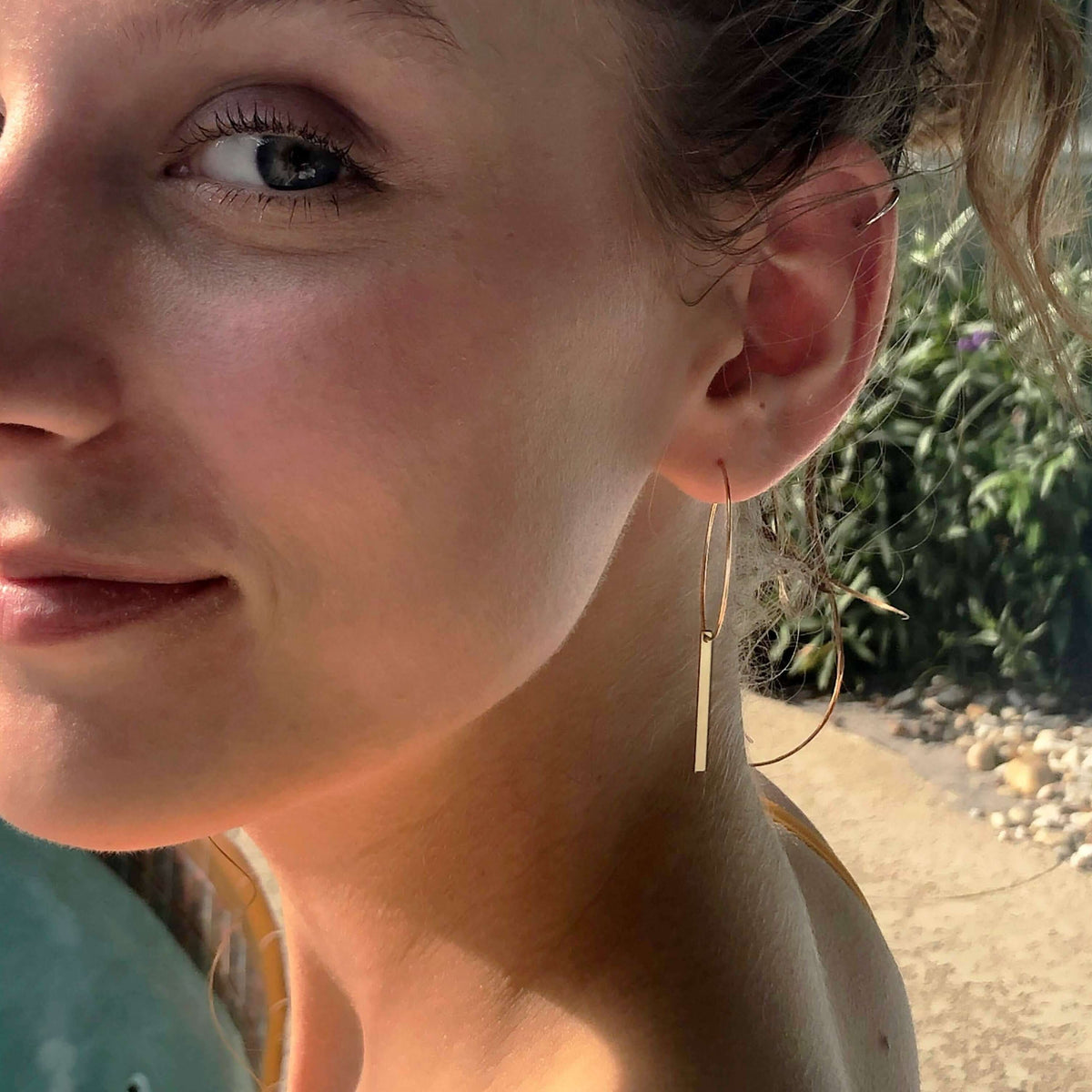 Twigs Hoop Earrings showcased on model, featuring a delicate design with twig detail and elegance.