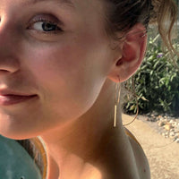 Twigs Hoop Earrings showcased on model, featuring a delicate design with twig detail and elegance.