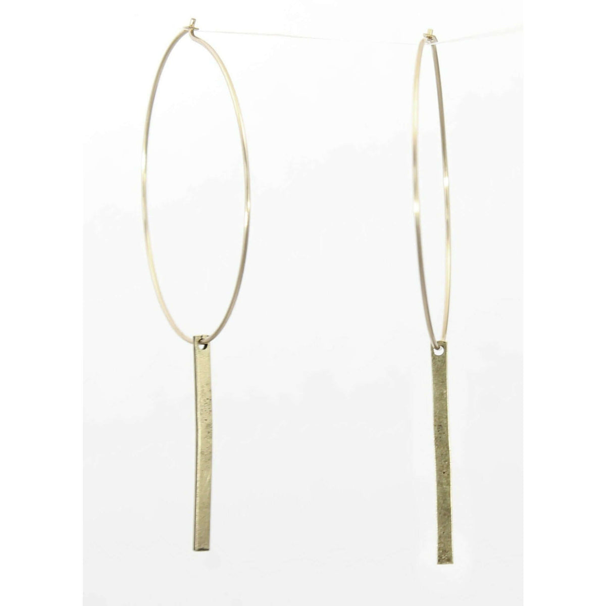 Twigs Hoop Earrings in antique brass finish with a stylish twig design, perfect for any outfit and easy to wear.