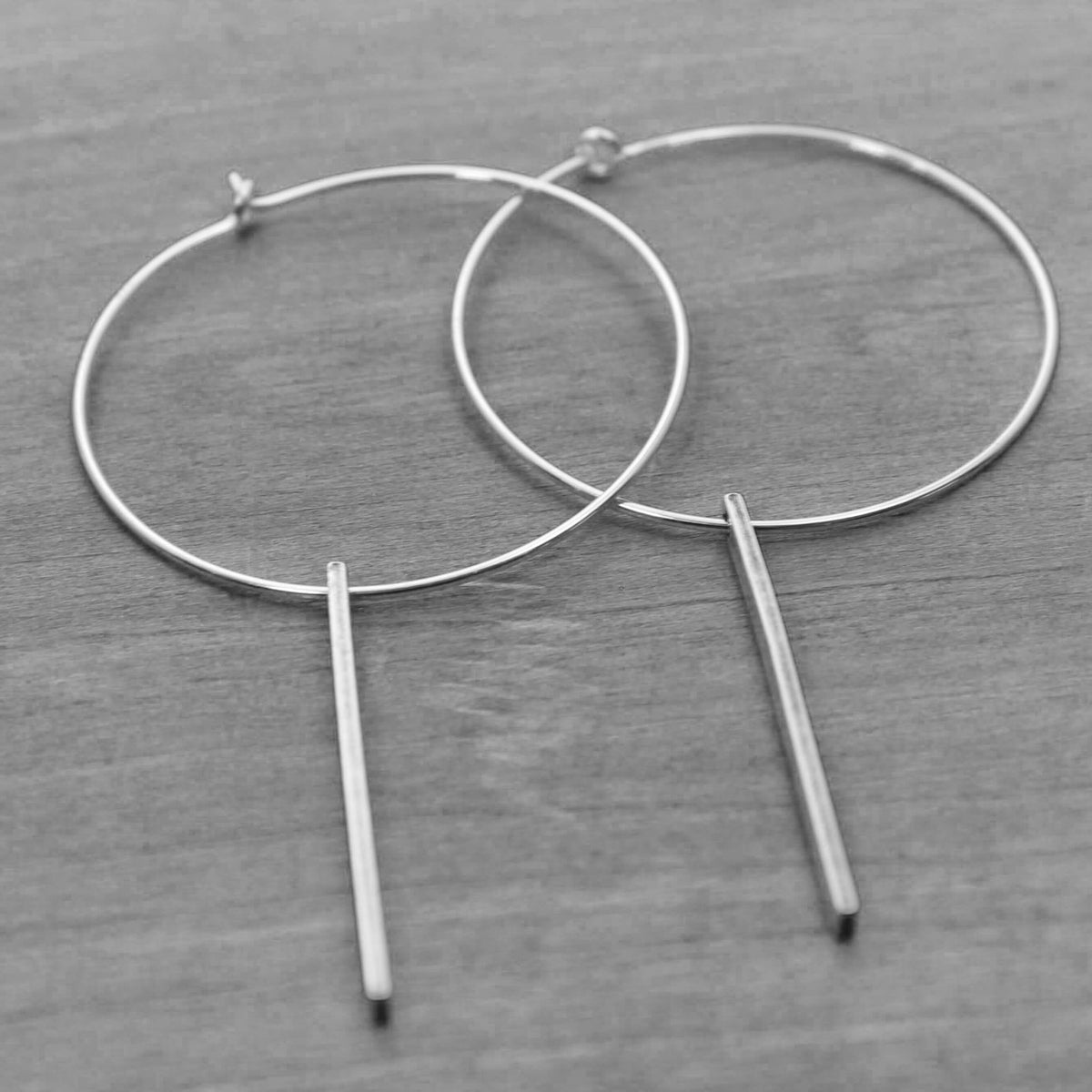 Twigs Hoop Earrings in Matte Silver with a simple twig design and classic hoop style.