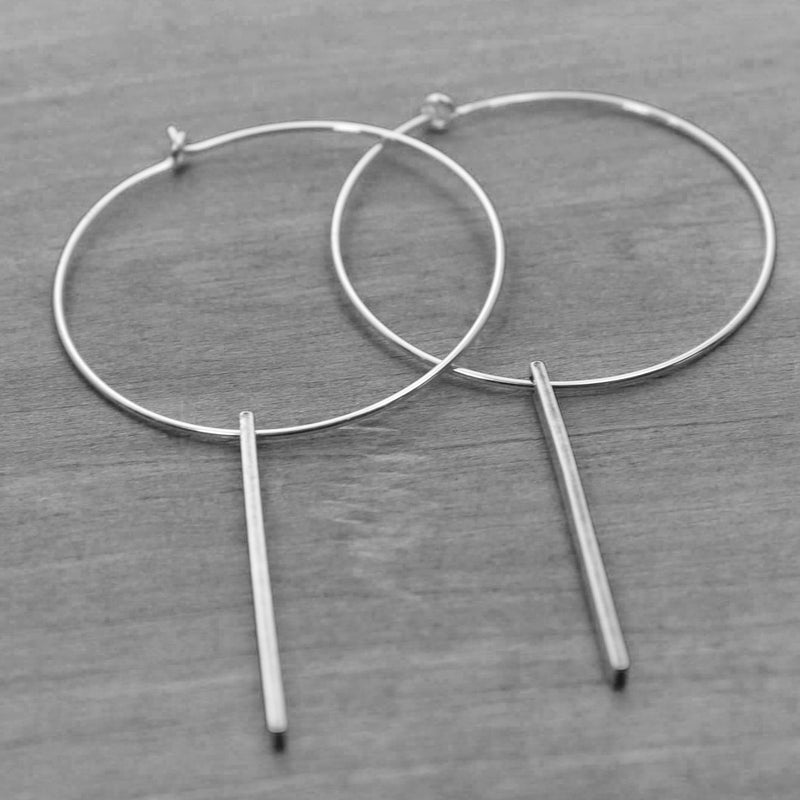 Twigs Hoop Earrings in Matte Silver with a simple twig design and classic hoop style.