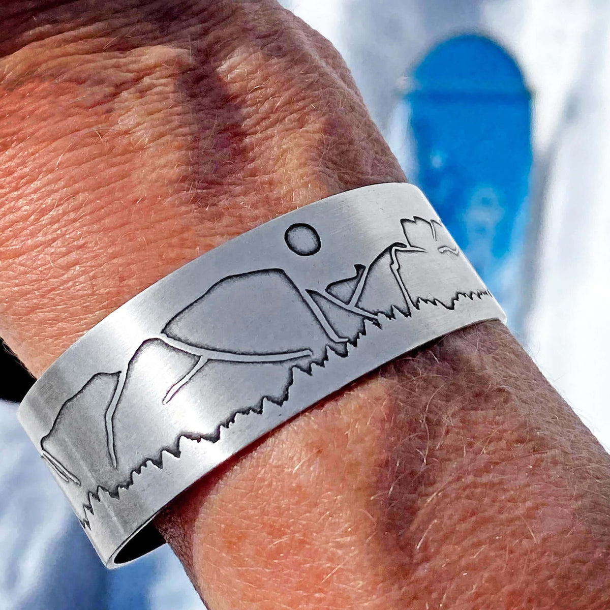 Yosemite Cuff Bracelet featuring El Capitan and Half Dome in a detailed etched design on a metal cuff.