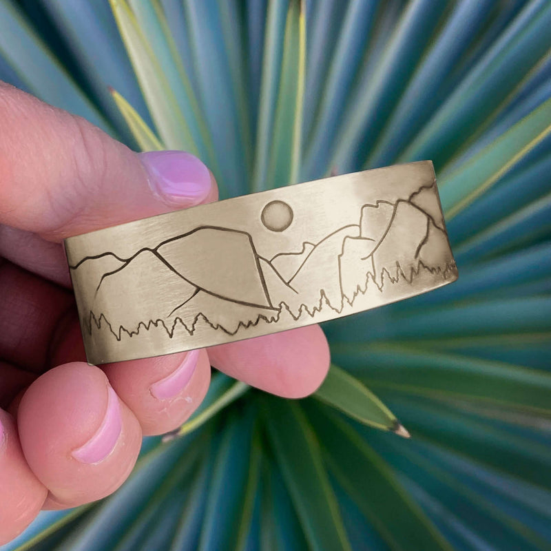 Yosemite Cuff Bracelet featuring a mountain landscape design inspired by Yosemite National Park.
