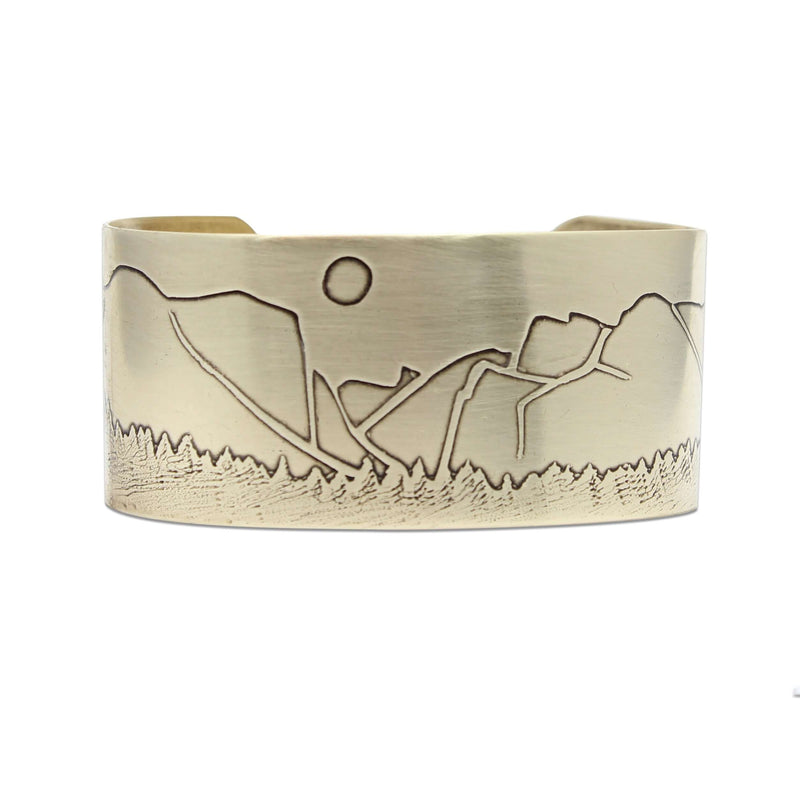Yosemite Wide Cuff Bracelet- featuring a detailed etched mountain landscape design in antique brass finish.